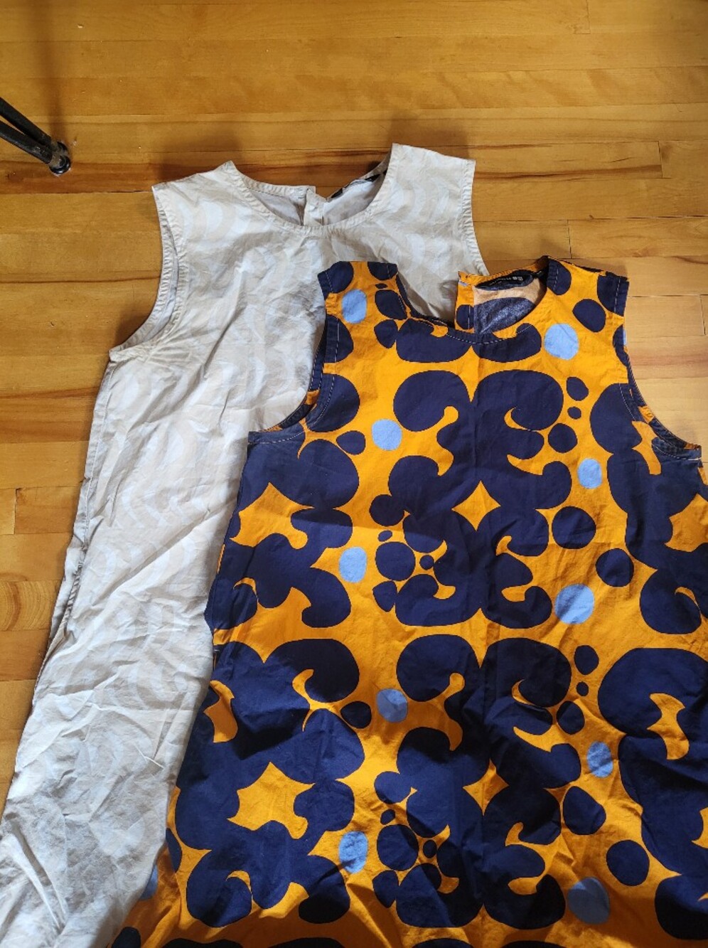 Two Uniqlo Women's Sleeveless  Dresses In Navy and Orange As Well As Beubge